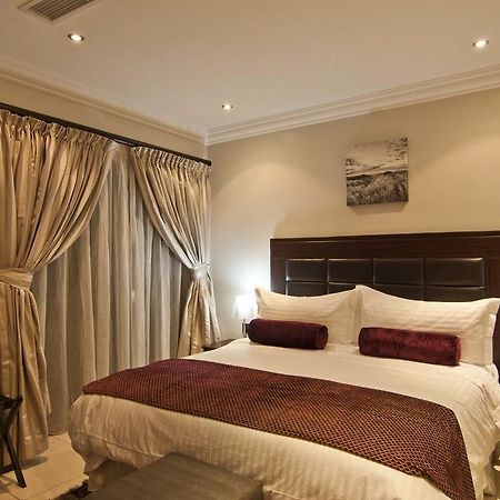 L'Eola Suites Абуджа Номер фото